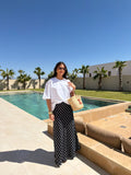 Jupe satinée à pois noire